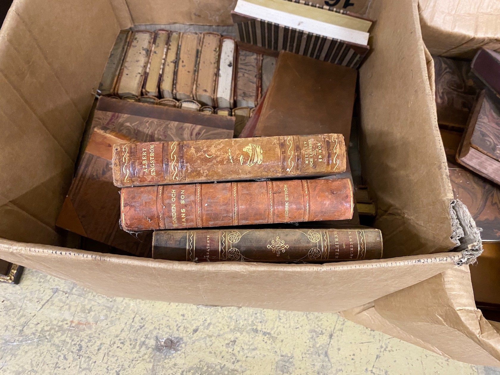 A quantity of assorted leather bindings